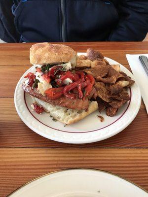 Andouille sausage on a ciabatta bun with red peppers and feta. Amazing!