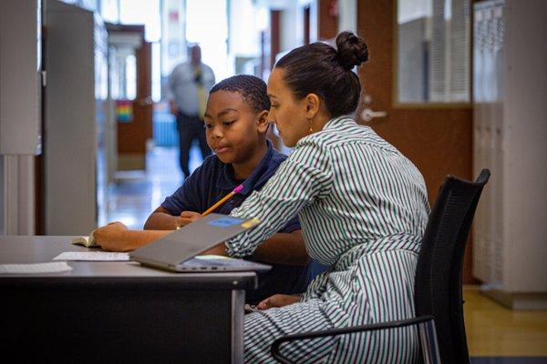 Individual support happens all the time at CJA.  Here, a 5th grade LAR teacher helps a student.