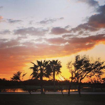 Sunset view of the fishing pond from our RV spot