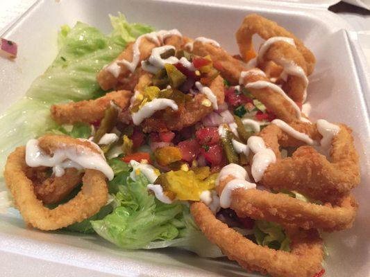 When the bartender forgets to order your food and you've got a flight to catch...you get styrofoam calamari. Thanks! I feel classy.