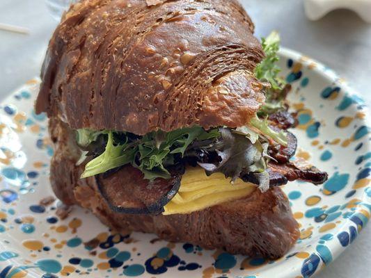 Breakfast croissant sandwich with added greens!