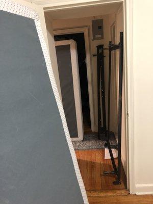 Owner delivered our stuff and left the old frames and box springs standing in the middle of our hallway