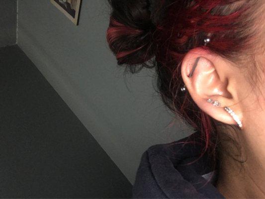 Two lobe piercings on my right ear ,along with the industrial bar piercing:)(already had the hoop)