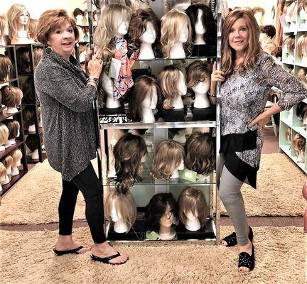 Ginny, Owner, is on the left, Janice, Ginny's Assistant, is on the right.