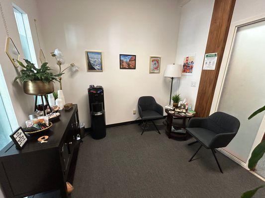 private waiting room with coffee, tea, and water on the house