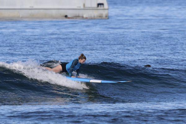 My sister in law getting up in a wave