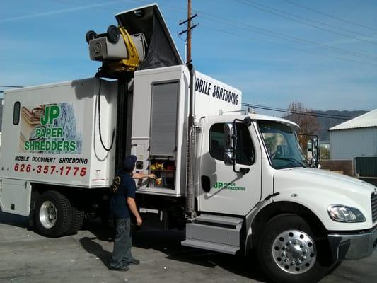 JP Paper's secure mobile shredding unit with operator Darrell Leiby