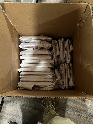 This is how we pack our customers breakables. This here is a photo of plates being packed into a medium box.