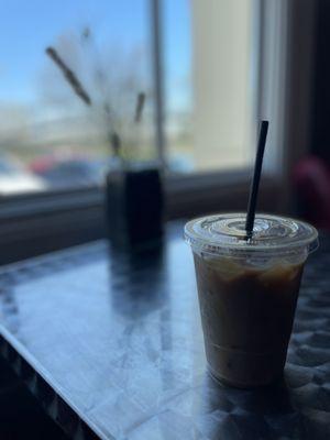 Iced coffee with almond milk and vanilla