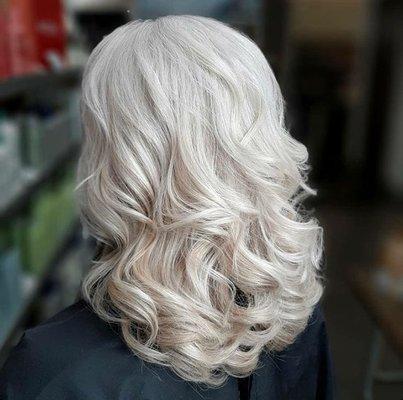 Effortless silver/gray blending to achieve this icy blonde look by stylist Krissy. Visit the best salon in Roseville for custom color.