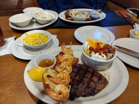 Are there today I had the steak n grilled shrimp  My son had the ribeye with double mashed potatoes.