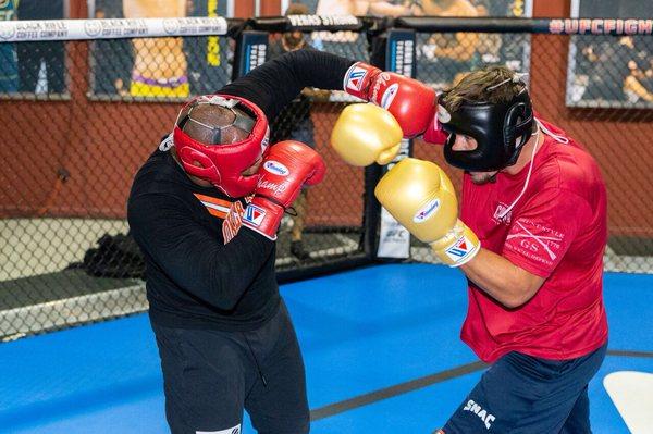 Coach Tony helping Daniel Cormier prepare in Las Vegas