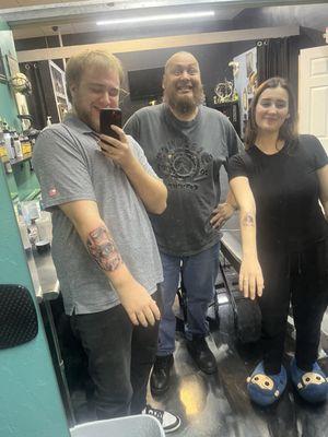 Tattoo artist and customers!