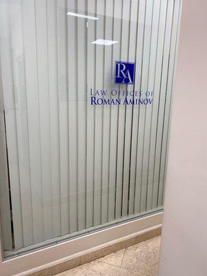 Law offices of Roman Aminov.