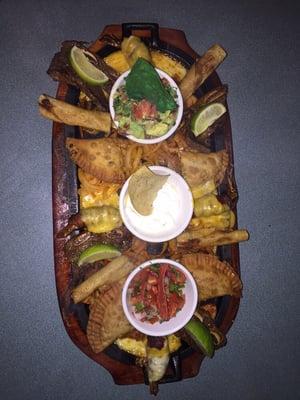 Awesome custom made appetizer plate. 3 friends, El Jefe Margarita's, this appetizer plate equals a great night.