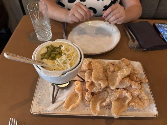 Chicharrones with queso and corn dip