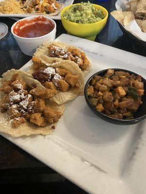 Chicken and waffles tacos with veggie hash