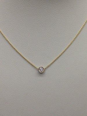 14k bezel set diamond pendant