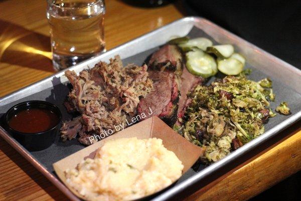 1/2 Texas Smoked Brisket ($10.50), 1/4 lb Smoked Pork Shoulder ($4.50), Brussels & Pork Belly ($6), Jalapeño Cheddar Grits ($6)