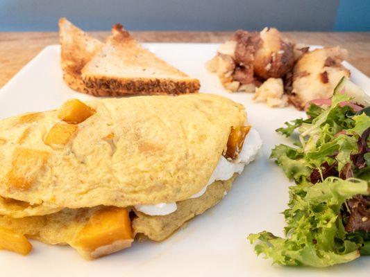 Butternut Squash omelet with kabocha pumpkin , caramelized onions & goat cheese