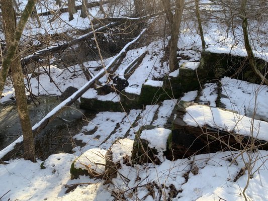 These days the pond has been by-passed with ADS corrugated pipe.