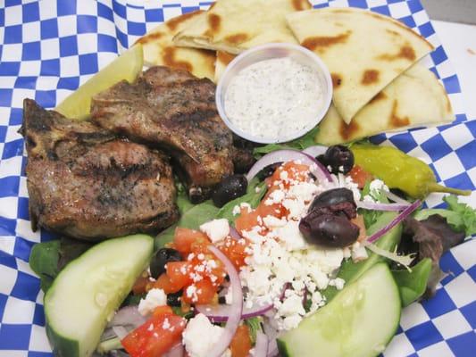 Lamb Chop Dinner... Char Broiled, Perfectly Seasoned and served with Greek salad, Tzaziki and Pita