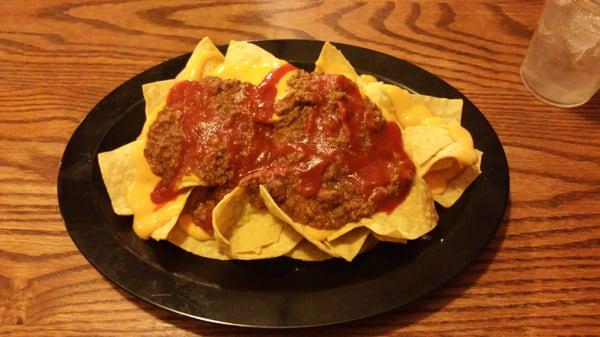 Supreme  nachos, hold the onions and peppers.