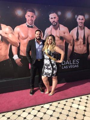 With host Mikey Perez in front of his own add at Chippendales