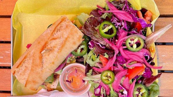 The Azteca sandwich with tofu instead of sausage, and salad. The Azteca has fresh avocado, pickled onions, and spicy jalapeños.