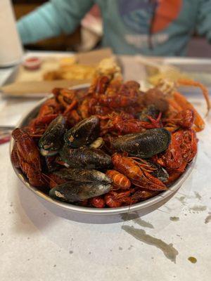 We did mussels , crawfish , and snow crab platter.