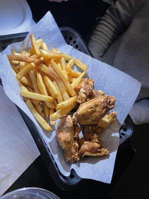 Chicken wings and fries