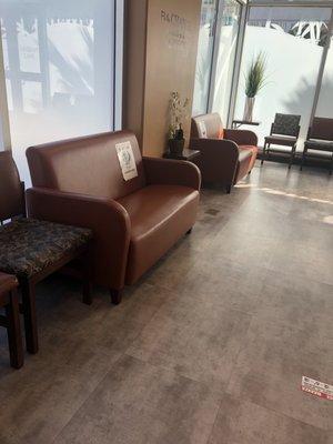 Comfy Couch and Chairs -- Seating Area in front of the reception desk.