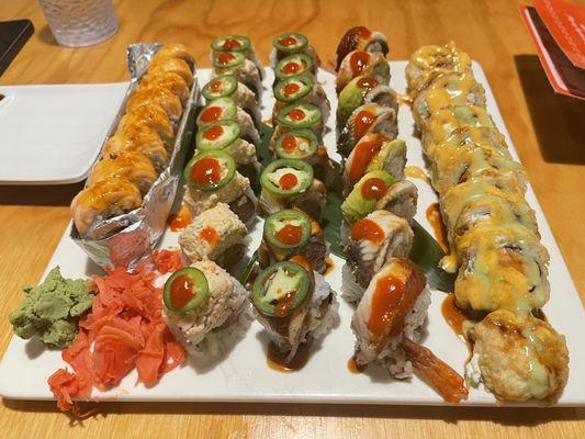 Basked salmon, Las Vegas, super dragon, and fire and other spicy tuna roll