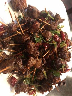 Toothpicks with lamb & cumin. Enough to feed an army.