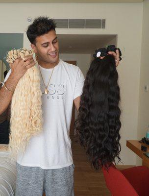 The Hair God handling young donor raw hair from the direct temple connections in south India.