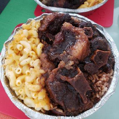 Oxtail with rice and mac & cheese. Tender but not enough favor. Could add a little more salt.  $17.50 (large)