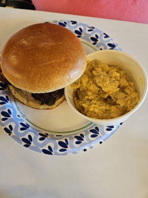 Pulled pork sandwich with potato salad