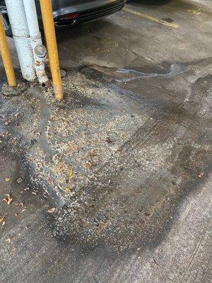 Parking garage pipes spewing rotten food