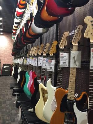 Rainbow row of gorgeous guitars