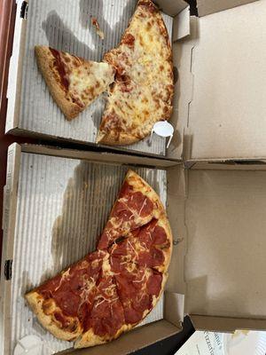 Cheese and a pepperoni medium pizzas.