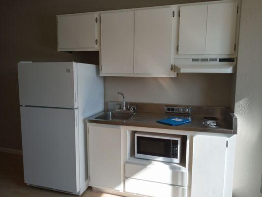 Very small & outdated Kitchen. The cabinets Look  nothing like the pics or the Model Home. Be prepared to have NO conter space.