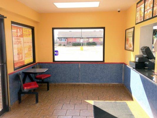 Small Dining Area with Two Tables (One Shown)