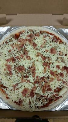 We have Take N Bake pizzas and cheese Sticks. This is our Famous Jim's Deluxe Take N Bake.