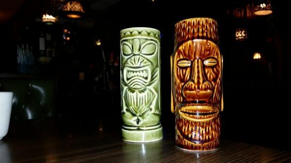 Old Chin Tiki mugs sold here at Chin's.