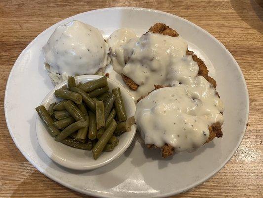 Chicken fried chicken meal with two sides