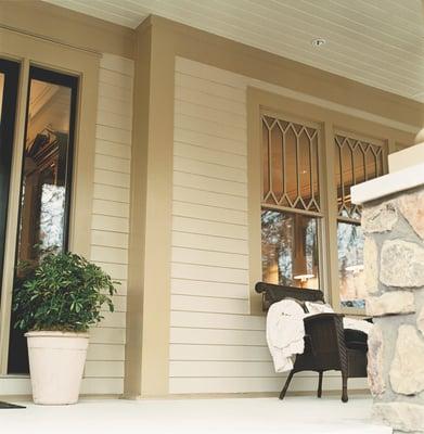 Enjoy the Texas Days on your front porch with Hardie siding and custom trim.