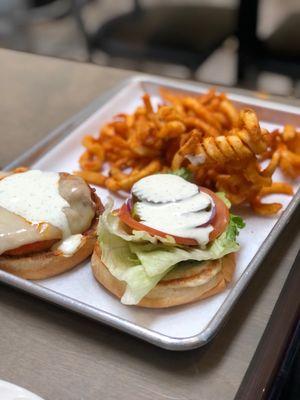 Spicy chicken sandwich with curly fries