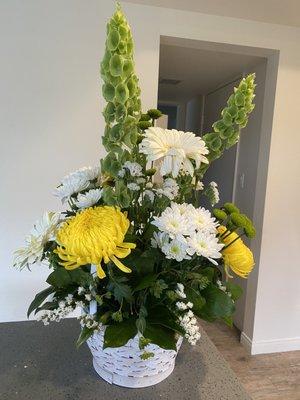 Custom flower arrangement to attend a funeral