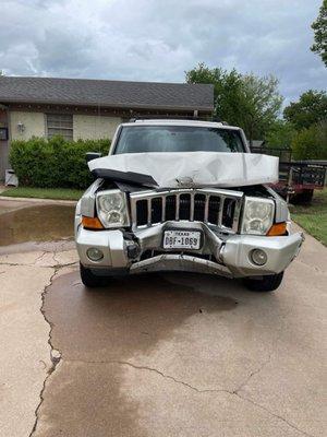 Totaled Jeep Commander driving  home drunk at 5:30am He says "he hit a fence!? No he hit a Tree behind the fence!