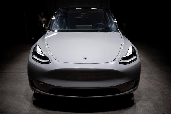 Tesla Model Y wrapped in Avery Dennison gloss Rock Grey and Gloss Black